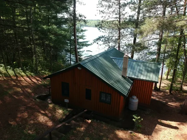 Brainerd Green Standing Seam Cabin — Collins Roofing