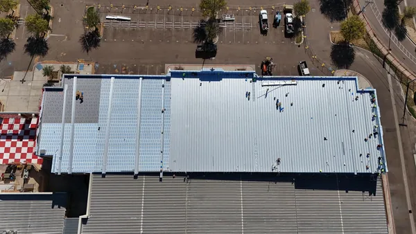Twin Cities Commercial Metal-Over-Metal — Collins Roofing