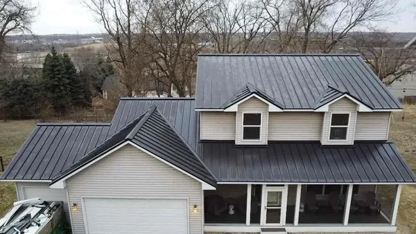 Cottage Grove Matte Black Standing Seam — Collins Roofing