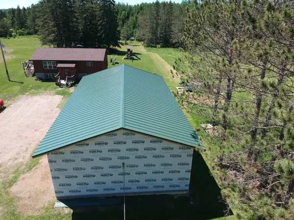 Continuous Green Standing Seam Roof — Collins Roofing
