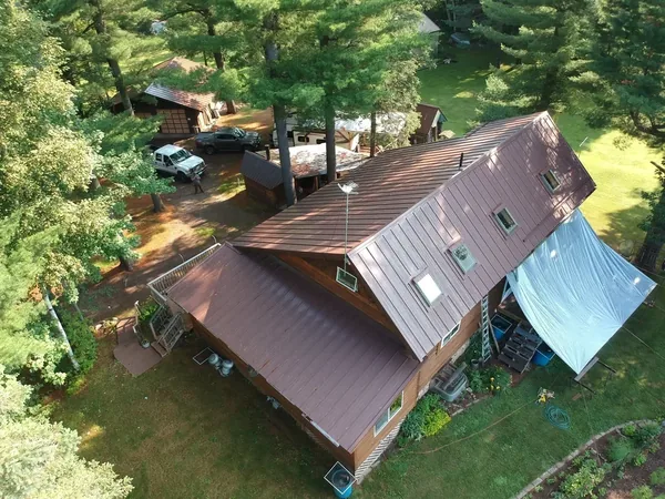 Ely Screw-Down Metal Roof — Collins Roofing