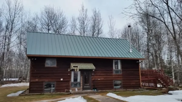 Ely Evergreen Standing Seam — Collins Roofing