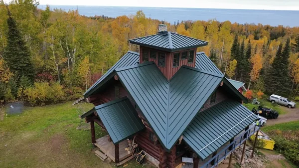 Grand Marais Green Standing Seam Lodge — Collins Roofing