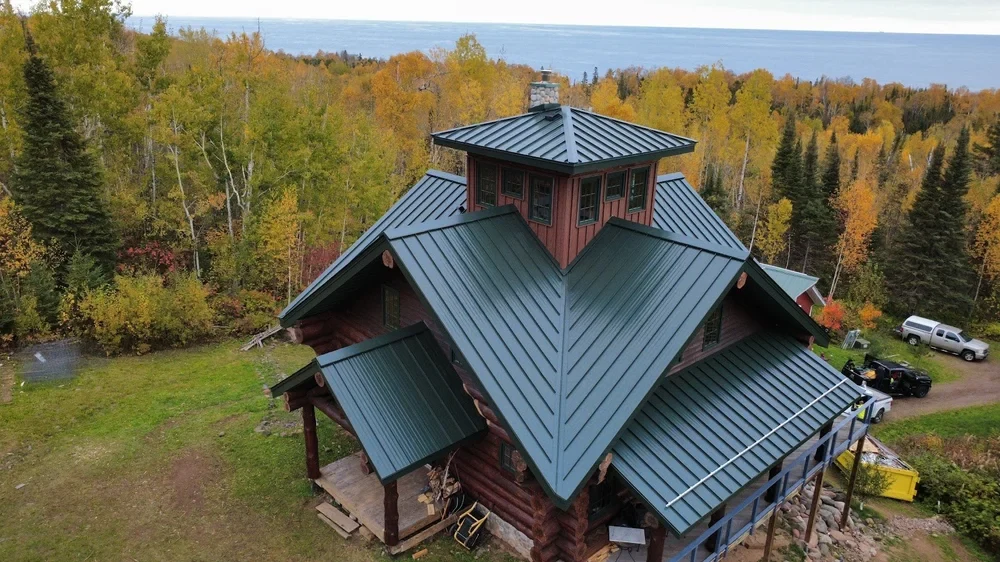 Grand Marais Green Standing Seam Lodge — Collins Roofing project photo
