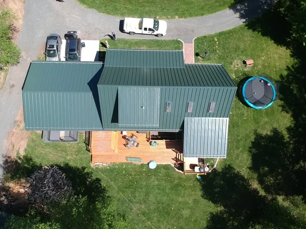 Poplar Standing Seam with Snow Bars — Collins Roofing