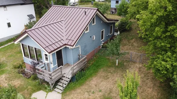 Wayzata Brown Standing Seam — Collins Roofing
